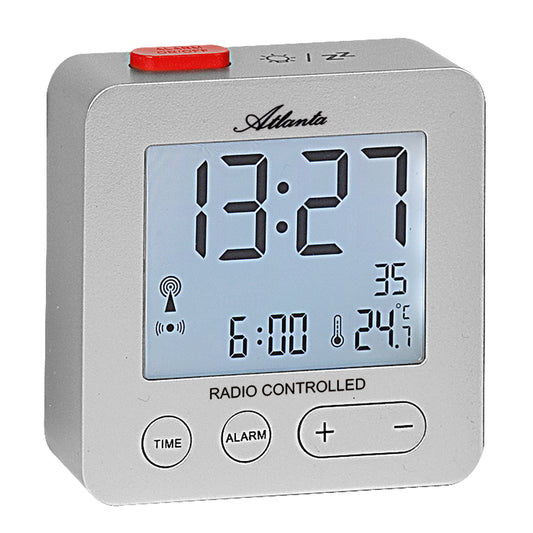 Réveil radio-piloté argenté avec écran LCD numérique, affichage de l'heure et boutons de commande