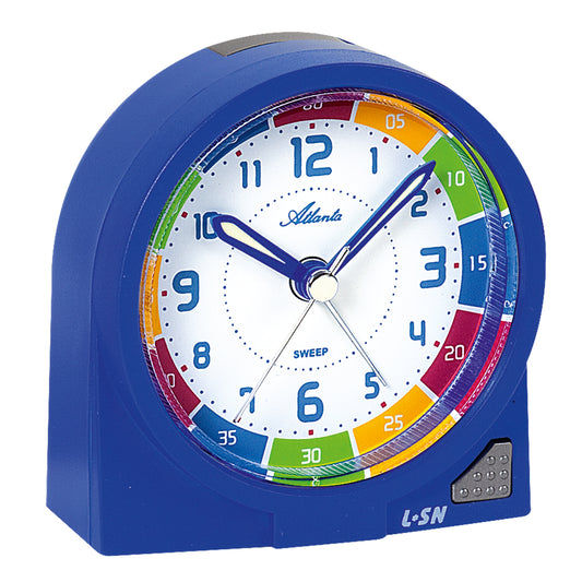 Réveil enfant bleu avec cadran analogique, chiffres colorés et élément lumineux en bas à droite