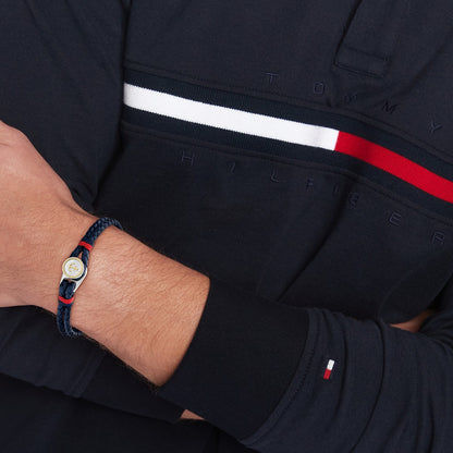 Herrenarmbanduhr mit blau-rot gestreiftem Band und goldfarbener Lünette