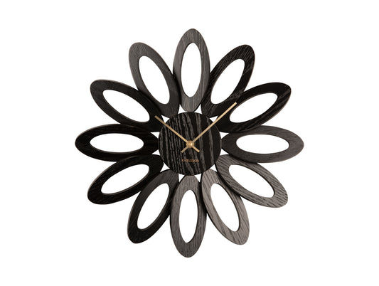 Horloge murale florale avec cadre à anneau noir et cadran sombre, aiguilles visibles