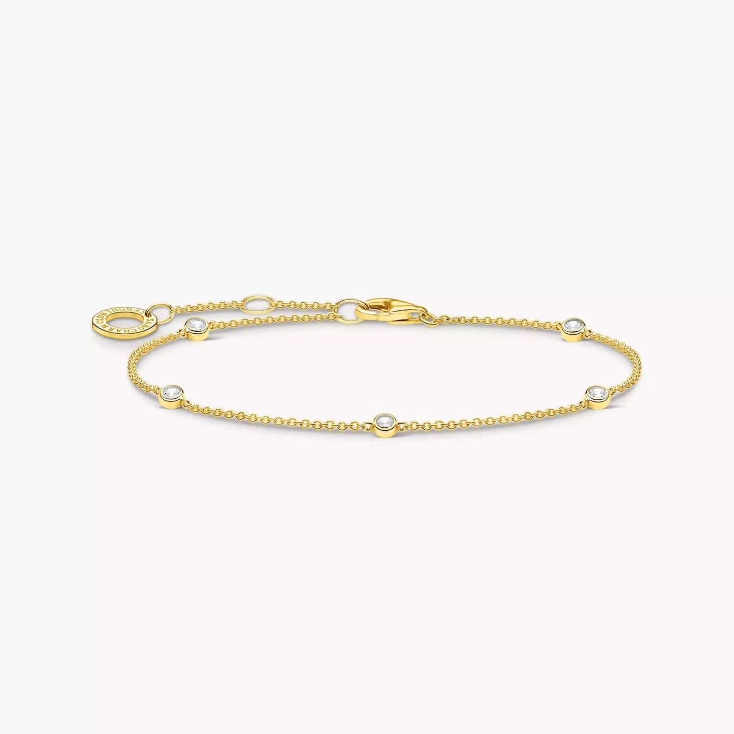 Bracelet doré avec pierres blanches et maillons ovales