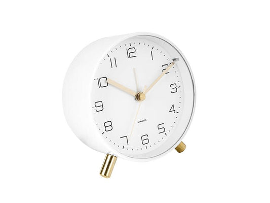 Réveil analogique blanc avec socle et cadran dorés, forme ronde