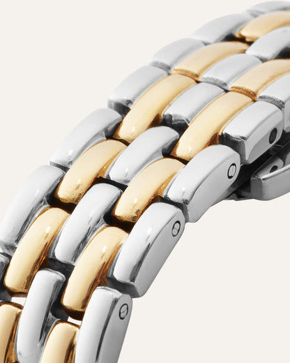 Detailansicht Damenarmbanduhr: zweifarbiges Gliederarmband aus Silber und Gold
