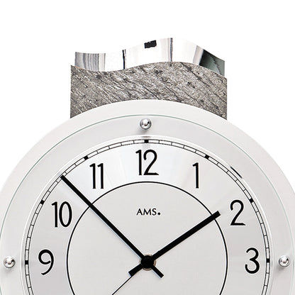 Horloge murale avec cadran en pierre naturelle, jeu d'aiguilles noir et façade ronde