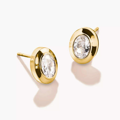 Clous d'oreilles ovales en monture dorée avec zircone cubique ovale scintillante