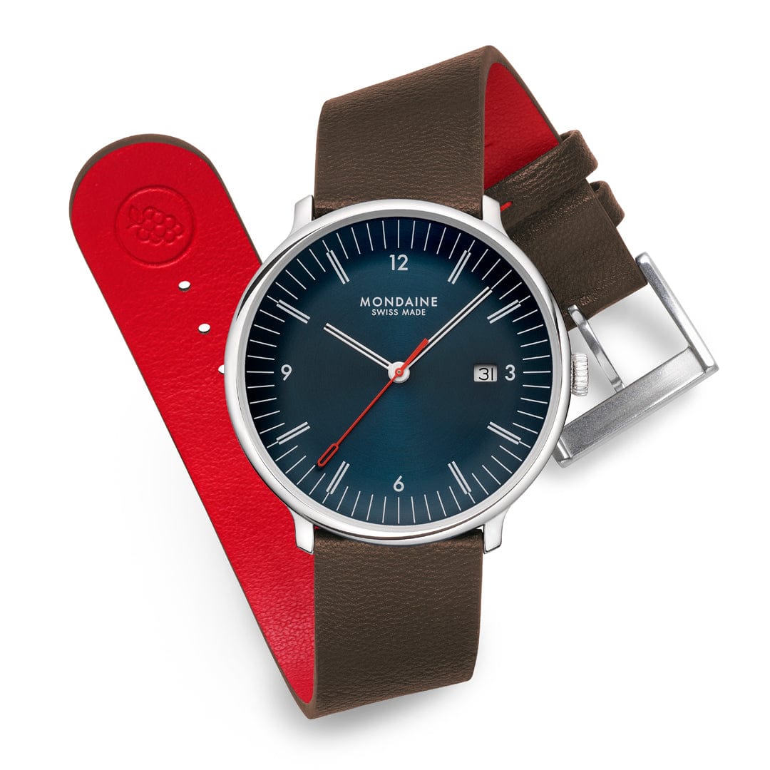 Herrenuhr mit braunem Lederarmband, dunkelblauem Zifferblatt und rotem Armbandfutter
