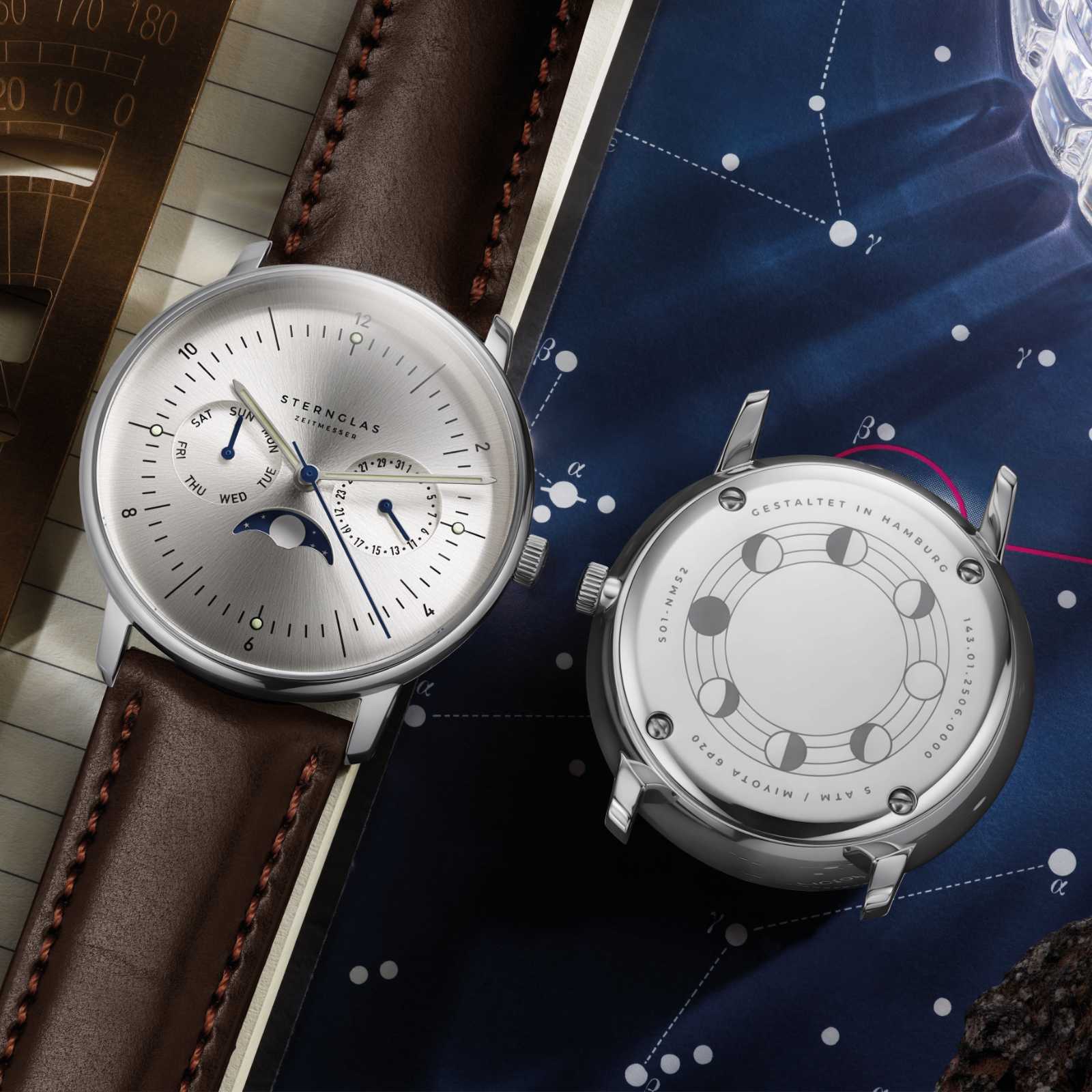 Montre Sternglas pour homme, recto verso, bracelet en cuir marron, boîtier argenté.