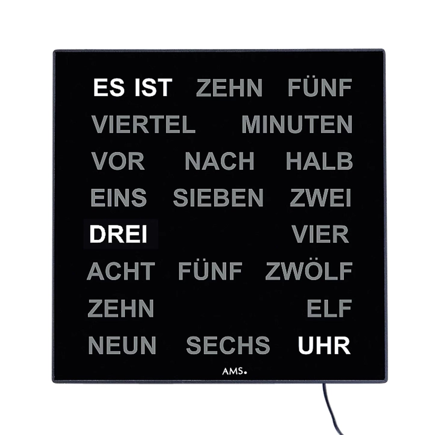 Table et horloge murale avec affichage LED textuel : écran noir avec le texte de l'heure « IL EST »