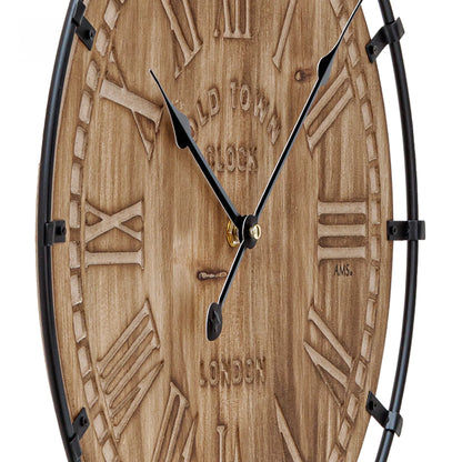 Horloge murale : cadran en bois avec aiguilles noires et index dorés, AMS