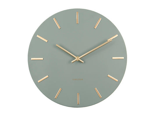 Petite horloge murale avec cadran vert et index dorés