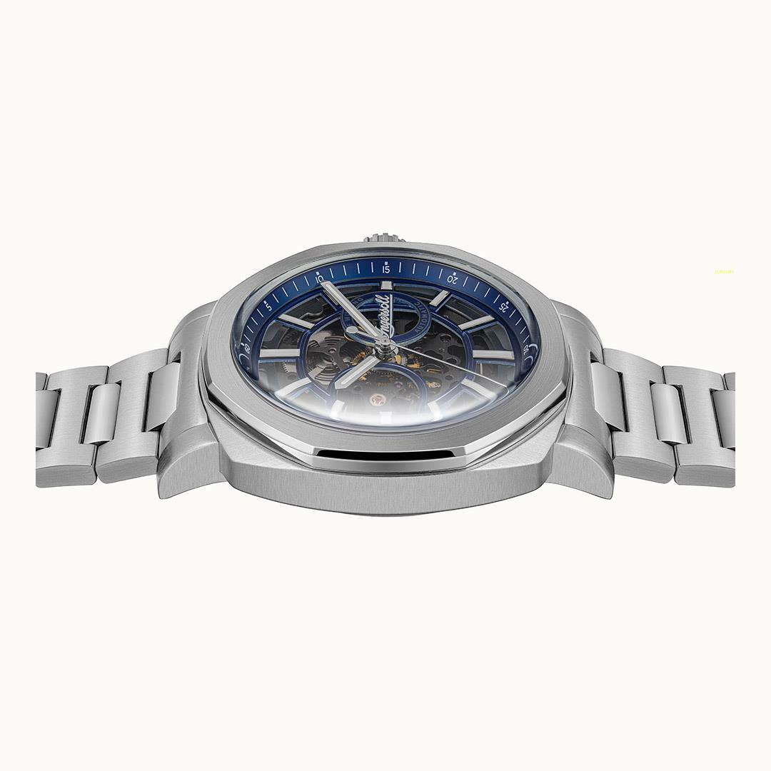 Herrenarmbanduhr von schräg oben: blaues Zifferblatt, offenes Werk, Edelstahlarmband