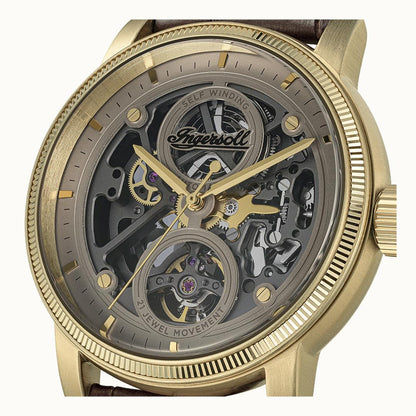 Ingersoll Automatik-Armbanduhr, Nahansicht Skelettwerk, goldenes Gehäuse, Mineralglas