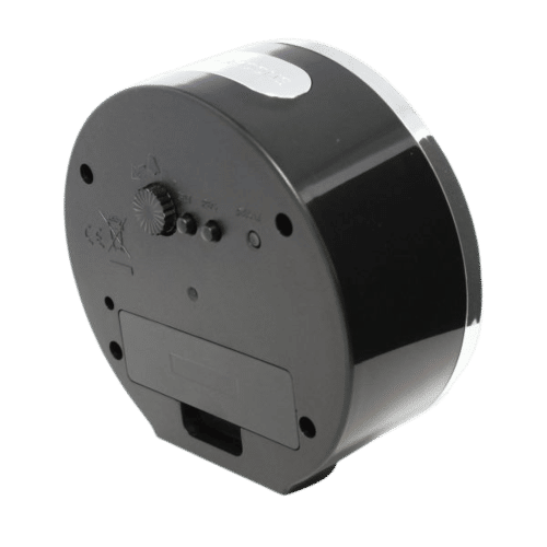 Vue arrière d'une horloge radio-pilotée avec ouverture pour haut-parleur, commandes et zone de connexion dans un boîtier noir