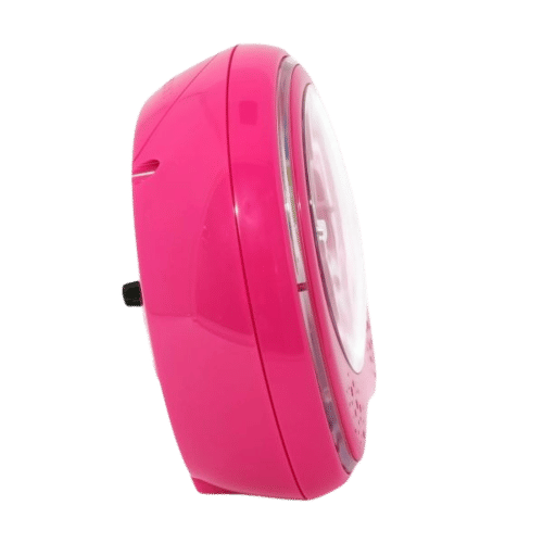Réveil rose avec côté cloche visible et cadre en verre transparent