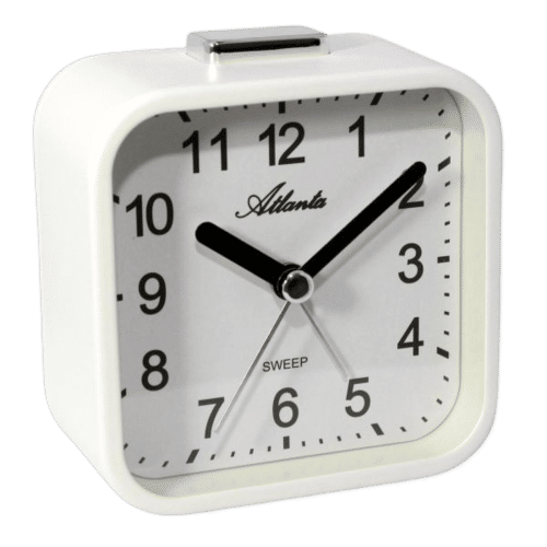 Réveil avec boîtier blanc, aiguilles des minutes et des heures noires, cadran analogique