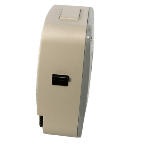 Dos d'un réveil analogique avec boîtier beige et couvercle rectangulaire