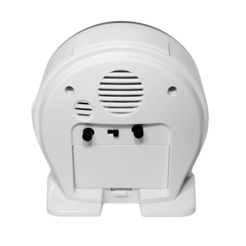 Arrière du réveil avec grille de haut-parleur et ports, boîtier en plastique blanc