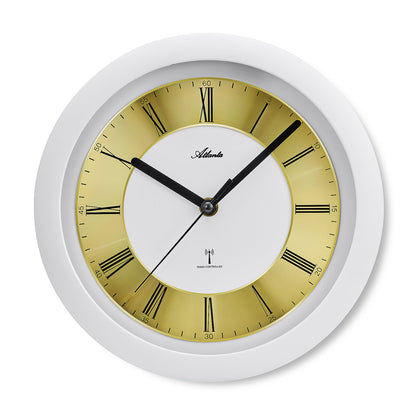 Horloge murale blanche avec cadran doré, chiffres romains et aiguilles noires