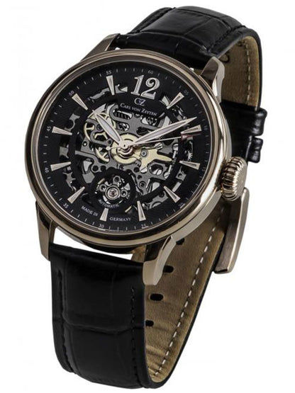 Herrenuhr mit schwarzem Lederarmband, roségoldener Lünette und Skelett-Zifferblatt