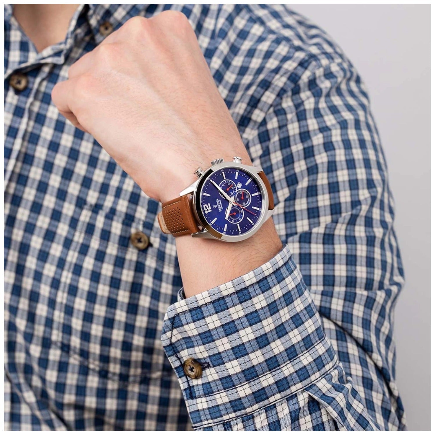 Festina Herrenuhr am Handgelenk, blaues Chronograph-Zifferblatt, braunes Lederband