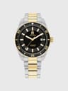Tommy Hilfiger Herrenarmbanduhr Detail: schwarzes Zifferblatt, gold-silbernes Metallband