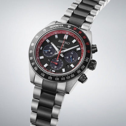 Seiko Prospex Speedtimer Herrenuhr mit schwarzem Zifferblatt, roten Skalen und Stahlband.