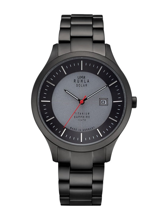 Montre-bracelet avec bracelet en métal noir et cadran gris, aiguilles rouges.