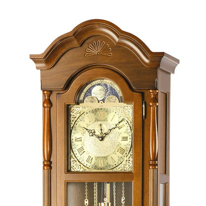 Pendule en noyer avec cadran visible, chiffres romains et mouvement à balancier