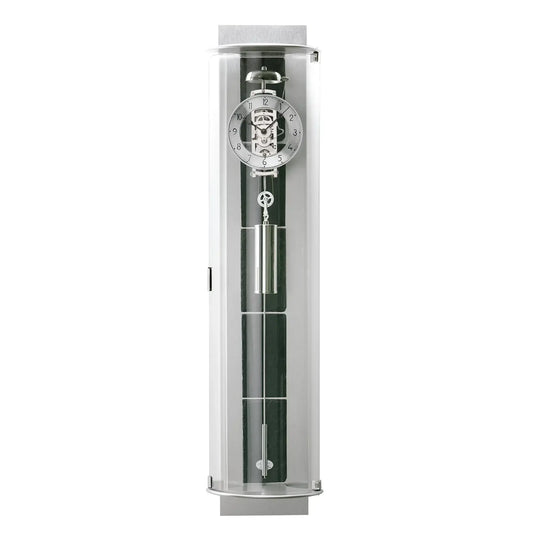 Horloge murale dans un cylindre transparent avec mouvement mécanique et insert en ardoise verte