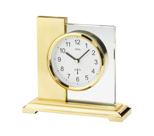 Guld klocka med rund urtavla, glasfront och stativ