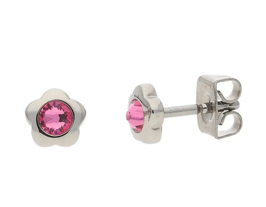 Titanörhängen i blomform med rosa zirkoner, rund infattning