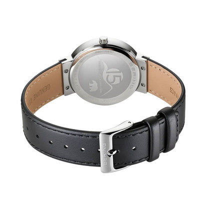 Bering damklocka med stiftspänne, svart läderarmband och silverfärgat hölje