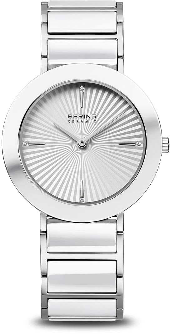 Bering damklocka med silverfärgat metallarmband, rund urtavla med strålmönster