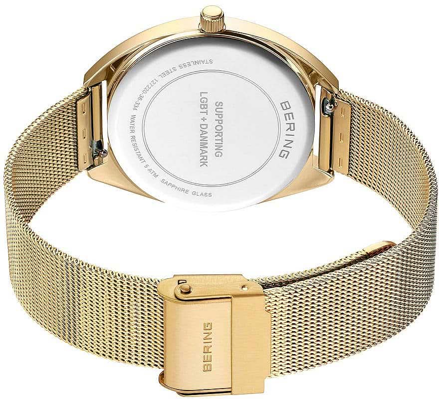 "Damklocka med silverfärgad urtavla och guldfärgat mesh-armband"