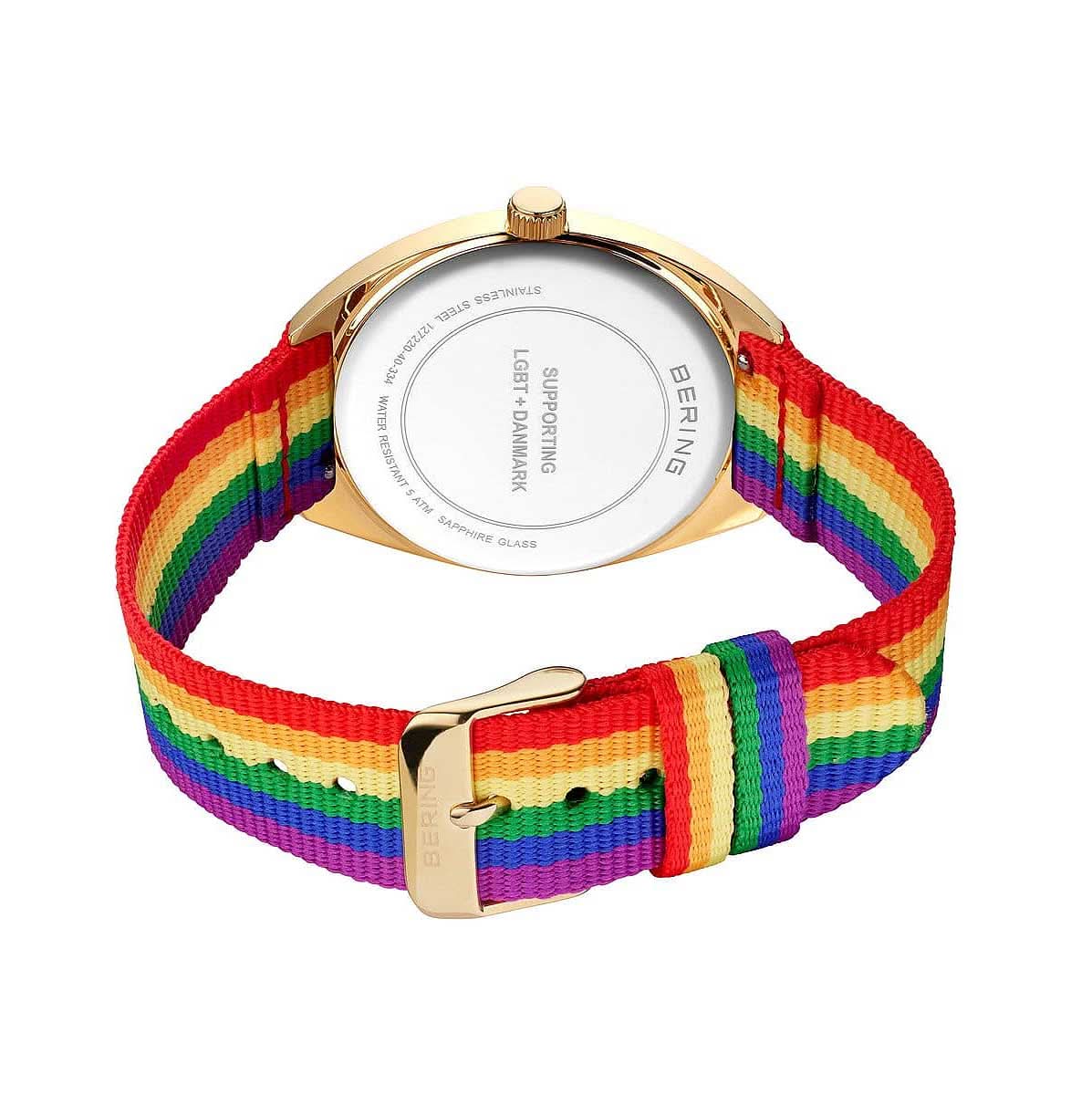 Armbandsur med baksida i guldfärgad boett och regnbågsfärgat tygarmband