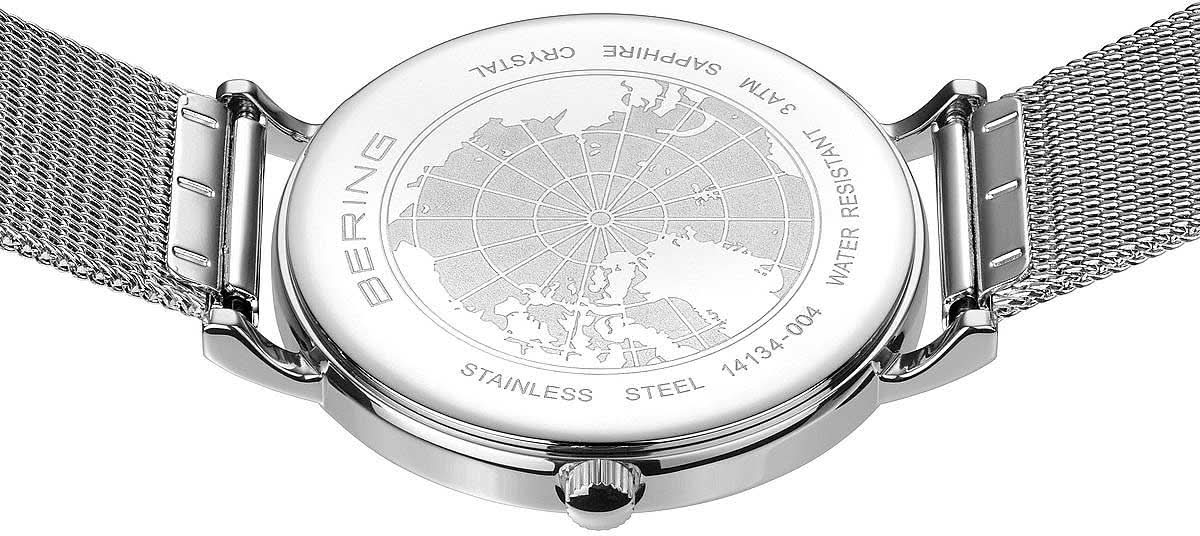 "Damklocka från Bering med demonstrationsbakstycke, världskartmotiv och armband i rostfritt stål med spänne"