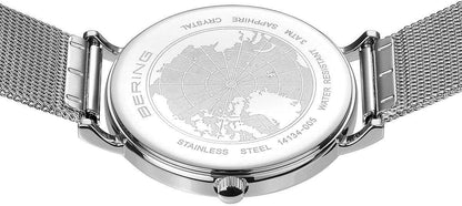 Damklocka med gravyr på baksidan och silverfärgat Milanese-armband