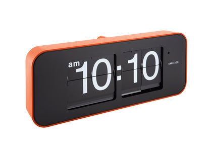 Orange väggklocka med fällbara siffror, dubbel display 10:10, svart front