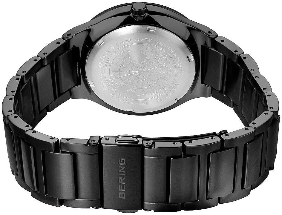 Herrklocka med boettlock och svart titanarmband, bakifrån