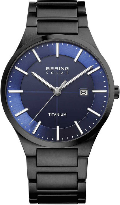 Herrklocka med blå urtavla, silverfärgade visare och svart titanarmband