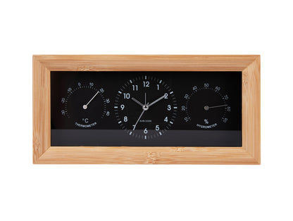 Rektangulär väggklocka med träram och svart urtavla, termometer och hygrometer