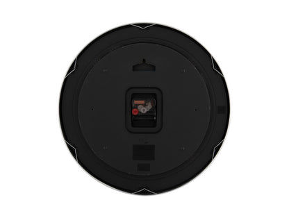 Baksidan av en väggklocka: svart hölje med batterifack och upphängning