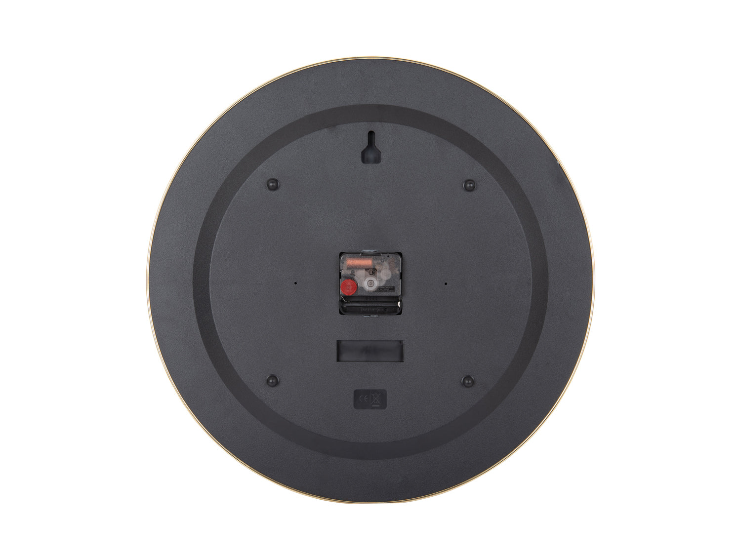 Baksida på väggklocka: svart hölje med upphängning och batterifack.