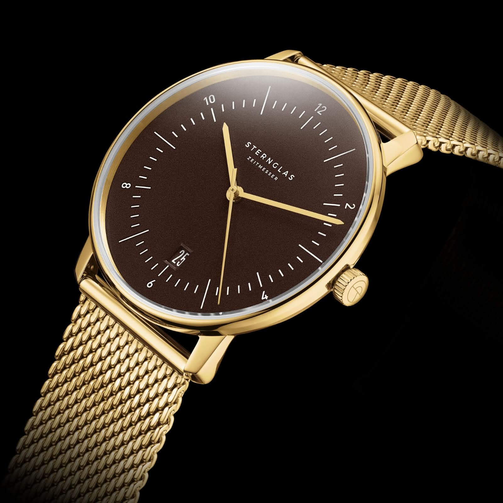 Sternglas herrur med brun urtavla och guldfärgat metallarmband
