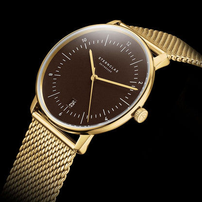 Sternglas herrur med brun urtavla och guldfärgat metallarmband