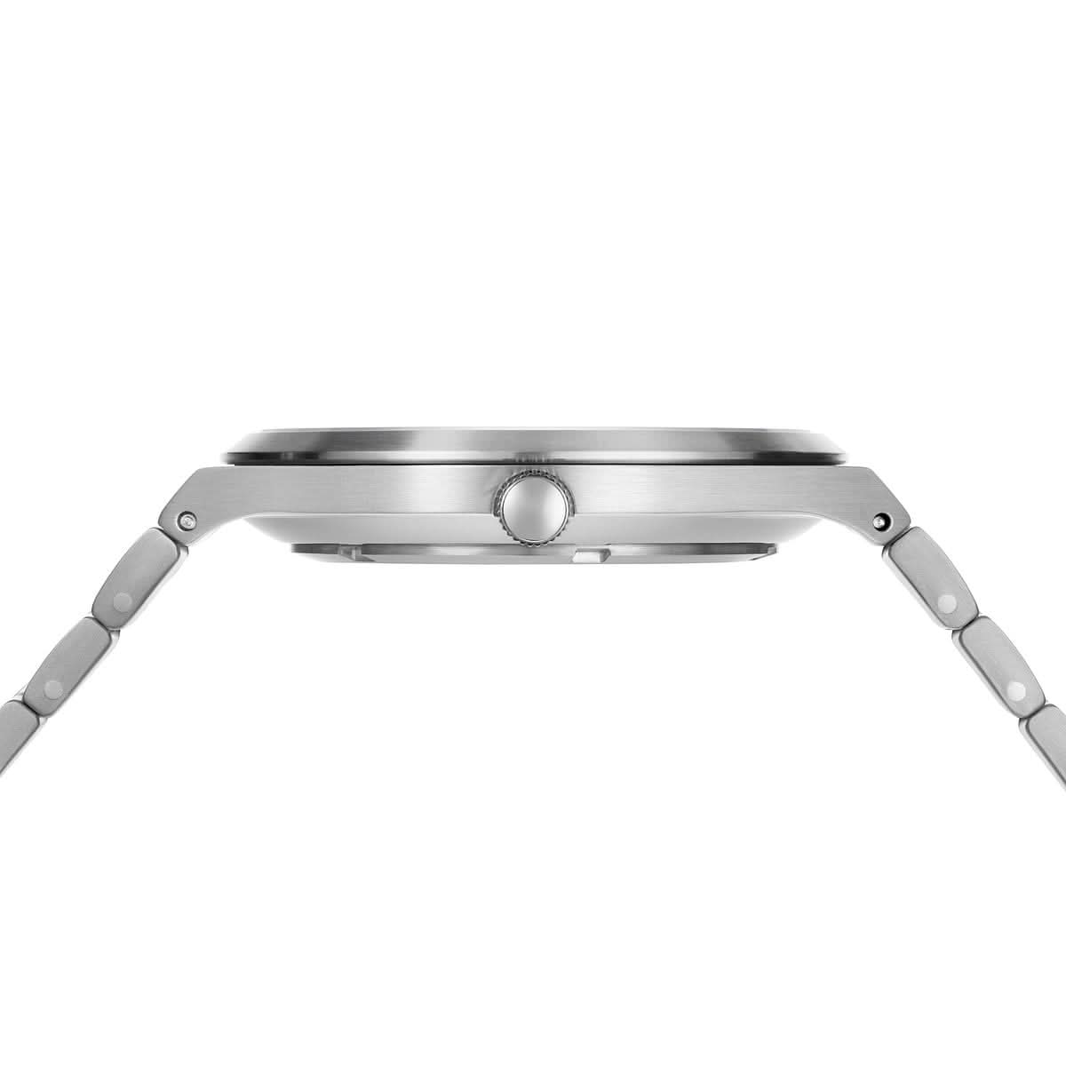 Klockfodral sida med krona, silverfärgad metall, platt profil