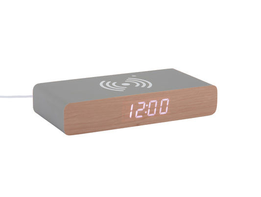 Platt LED-väckarklocka med träfront, visning 12:00 och WLAN-symbol på ovansidan