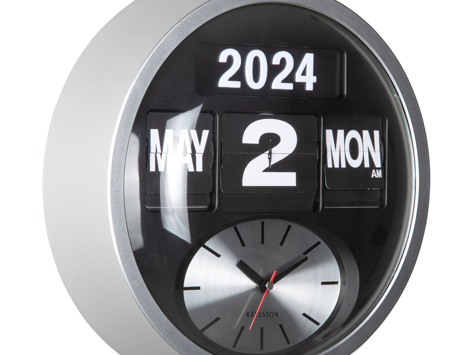 Rund väggklocka, närbild: vikbar datumkalender (2024/2), analog urtavla