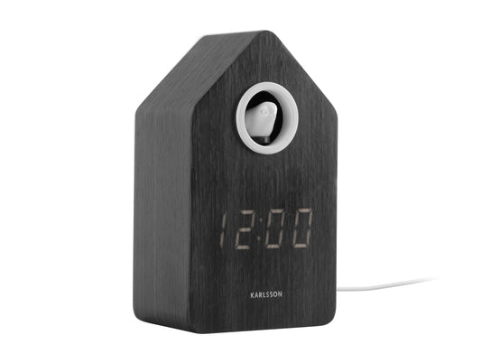 Väckarklocka i trä med LED-display och rund öppning, mörk trälook