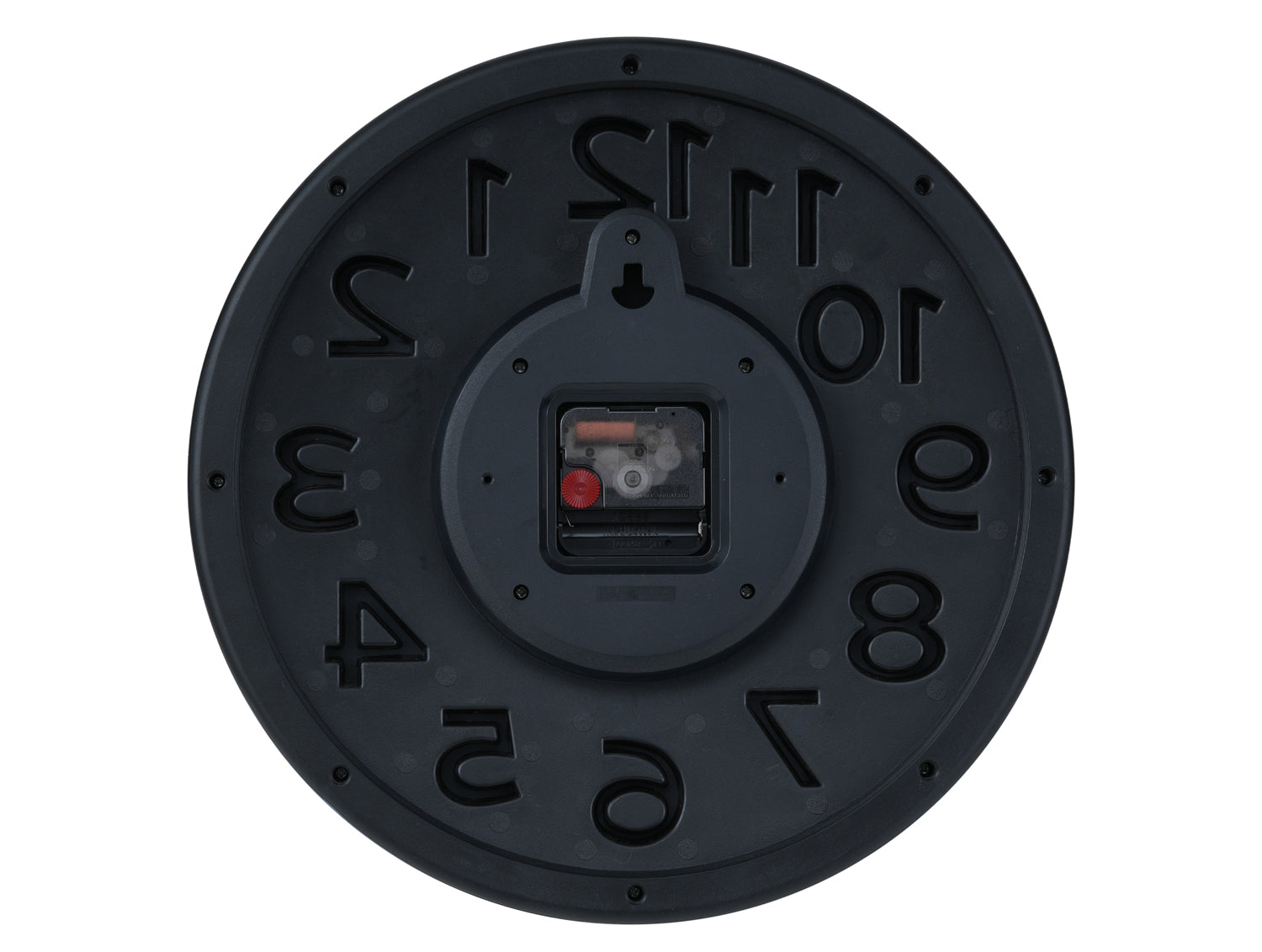 Karlsson väggklocka baksida med siffror och synligt urverksfönster